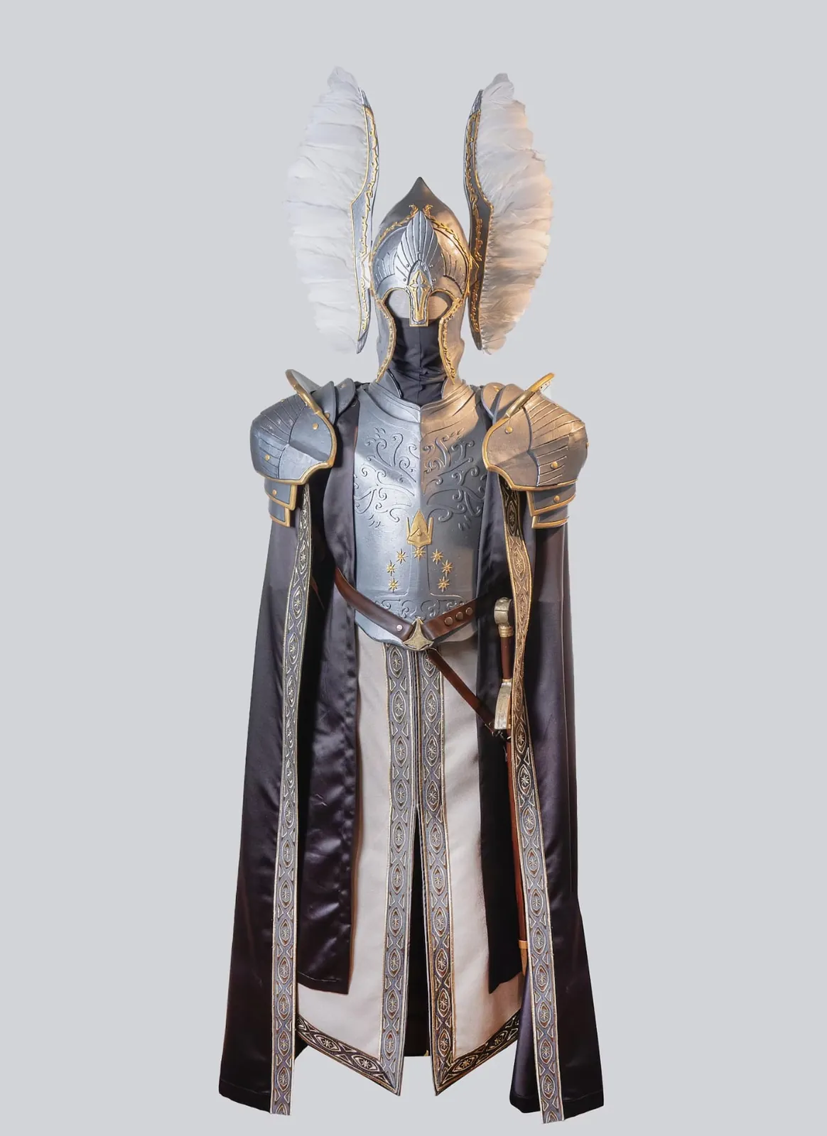 Guard costume with a winged helmet, armor and cloak on a mannequin