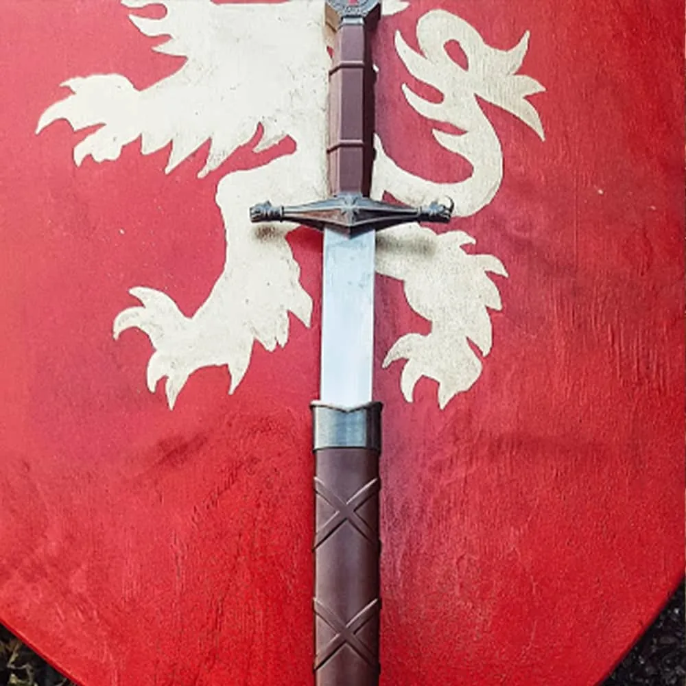 Blade with a cross guard on a red shield with a lion